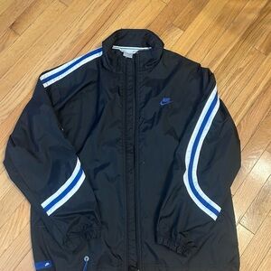Vintage y2k Nike Men's Black Windbreaker with Blue Stripes